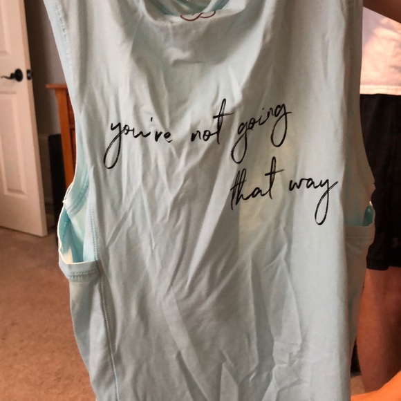 An athletic shirt - Picture 2 of 3